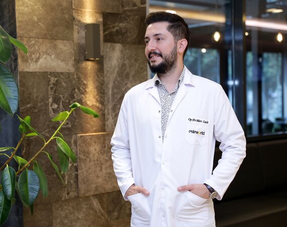 Dr. Mert Canli